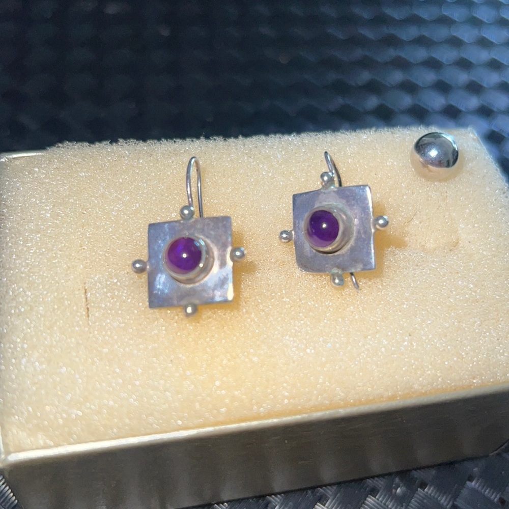 925, sterling silver gemstone (purple color- don’t know actual name of stone).